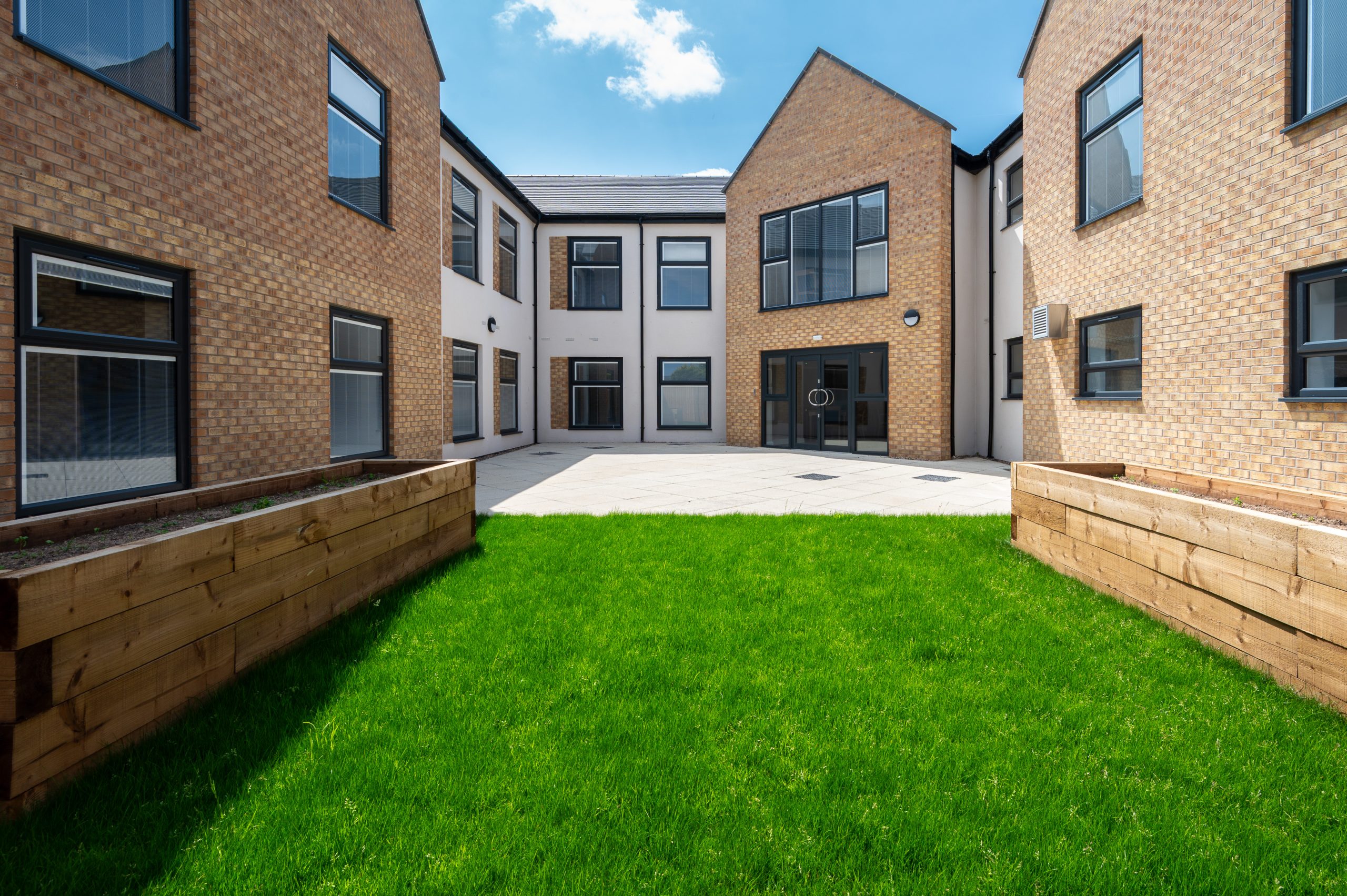 A secure, controlled entrance that keeps the building calm and welcoming