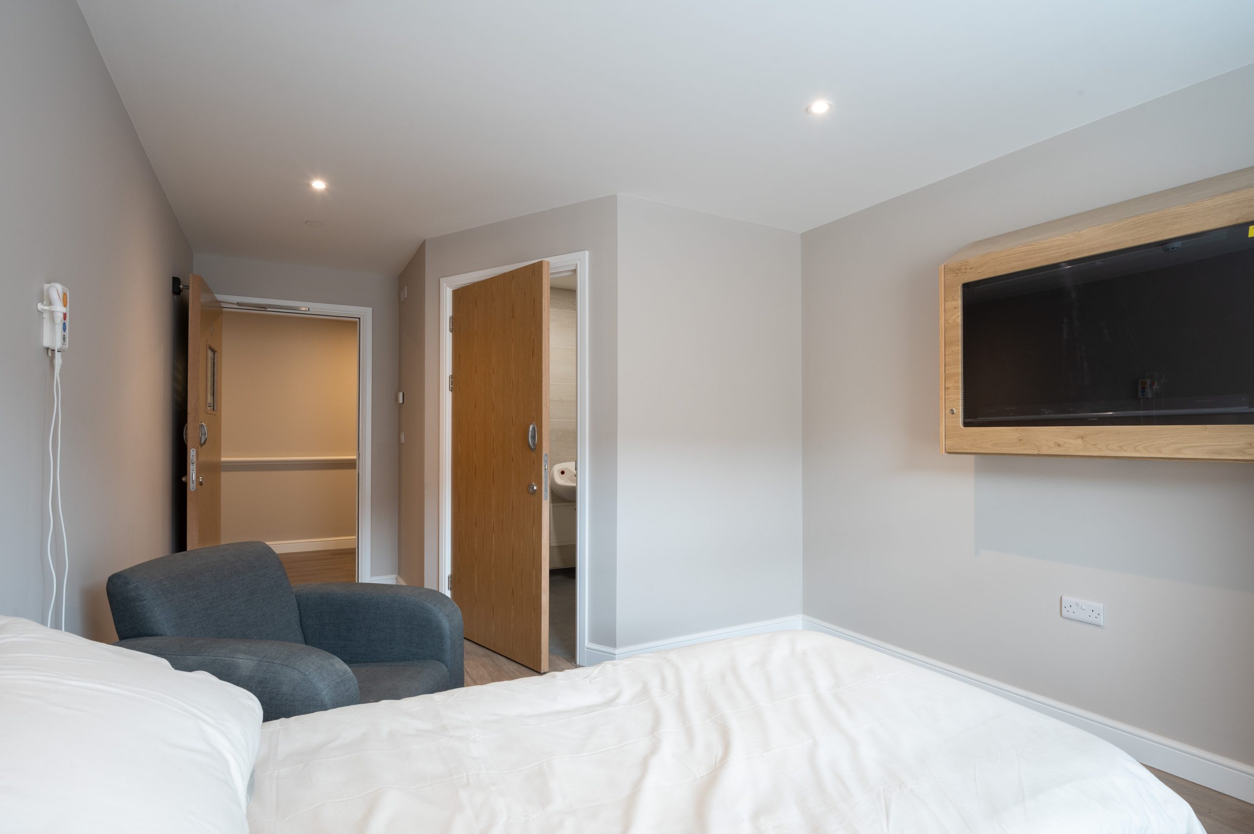 A calm, recovery-focused bedroom environment at Bancroft Care Centre